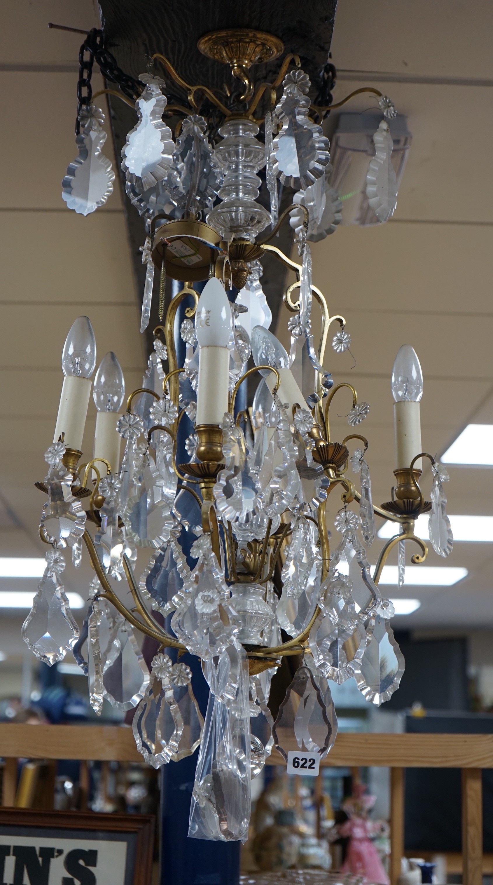 A late 19th/early 20th century French ormolu and lustre hung chandelier, drop approximately 70cm